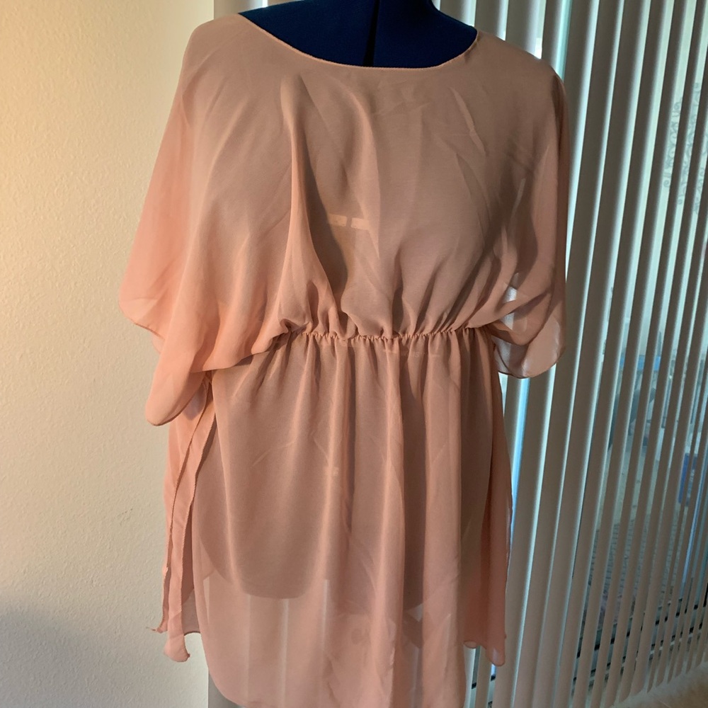 bathing suit, cover-up Tamsy one size cover up is sheer peachy rose color.